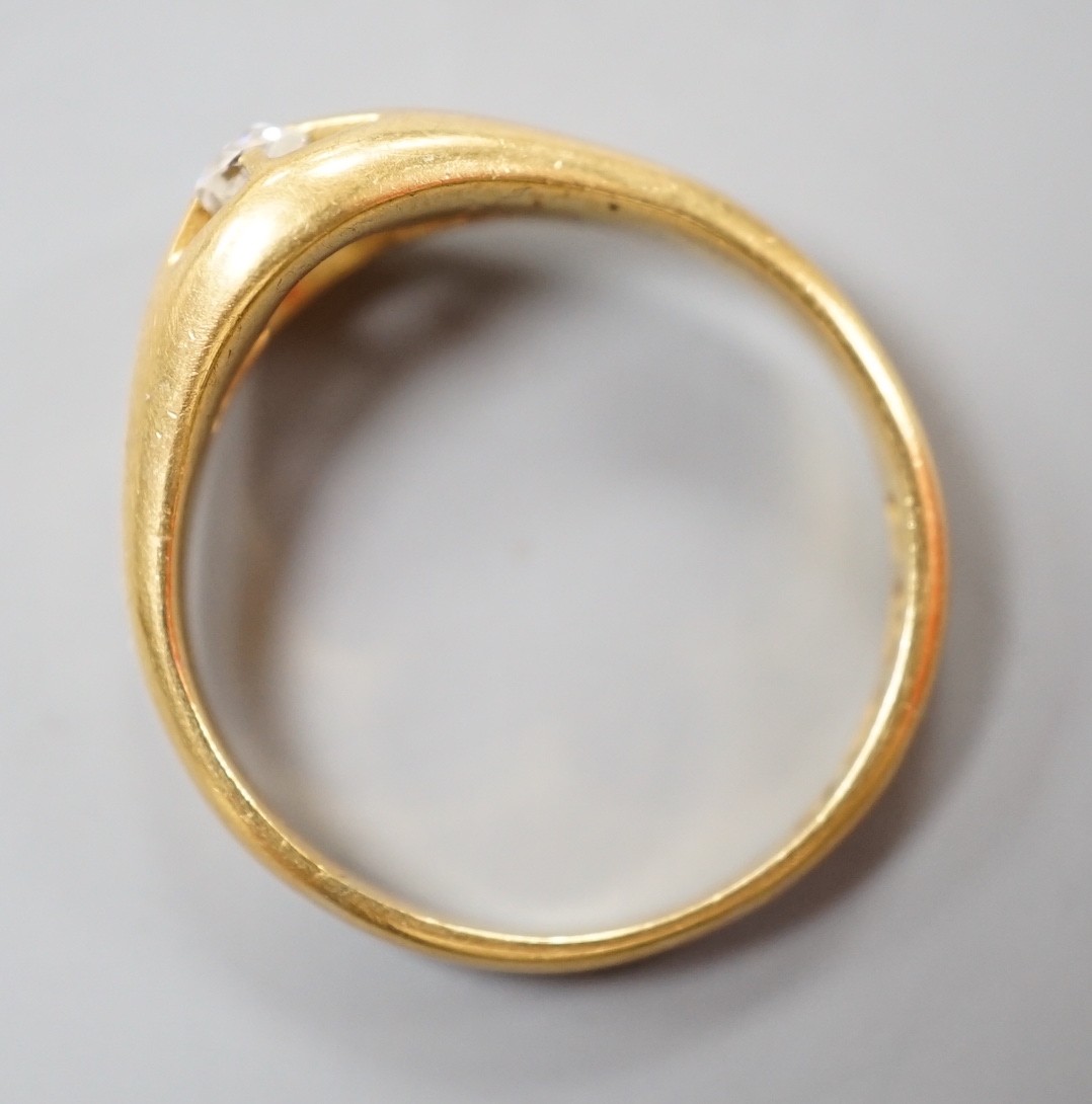 A late Victorian 18ct gold an claw set solitaire diamond ring, size Q, gross weight 5.2 grams.